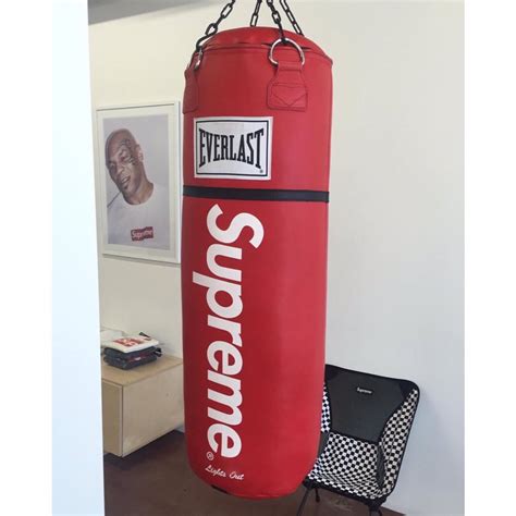 replica supreme punching bag|real supreme shirt stitching.